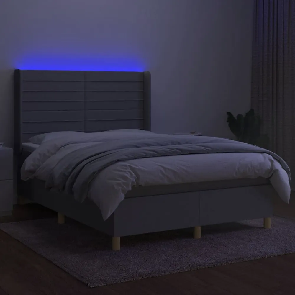 Cama box spring com colchão e LED 140x190 cm tecido cinza-claro