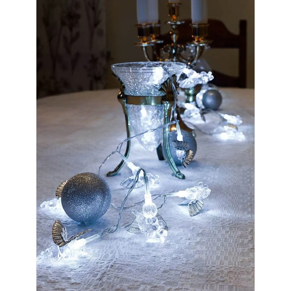 Cadeia de luzes decorativas LED anjos cor de prata 24 díodos brancos frios