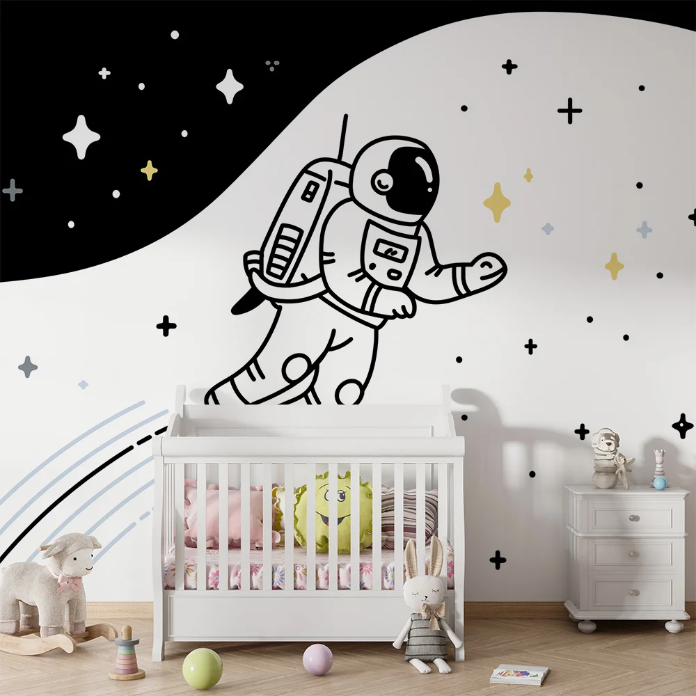 Papel de parede crianç | Astronauta flutuando em um espaço estrelado em preto e branco