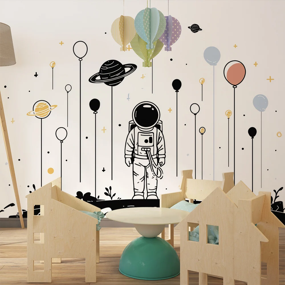 Papel de parede crianç | Astronauta e planetas coloridos no espaço