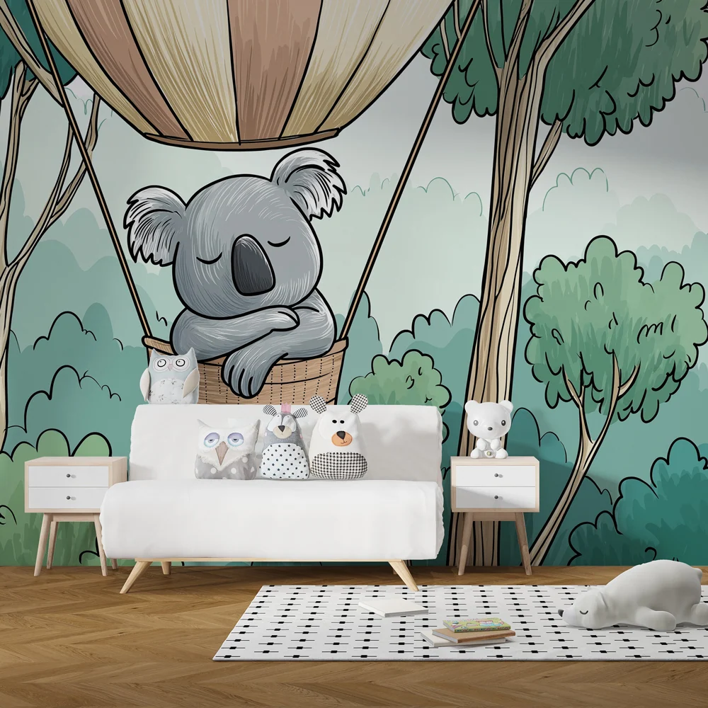 Papel de parede crianç | Koala num cesto acima da floresta
