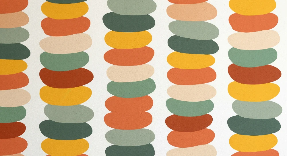 Papel de parede crianç | Padrões coloridos de seixos em tons suaves