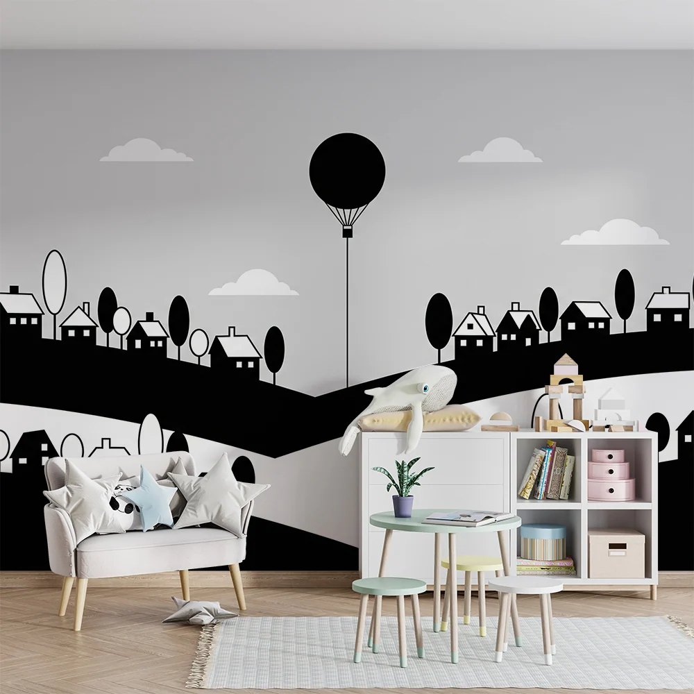 Papel de parede crianç | Paisagem monocromática com balão de ar quente e casas