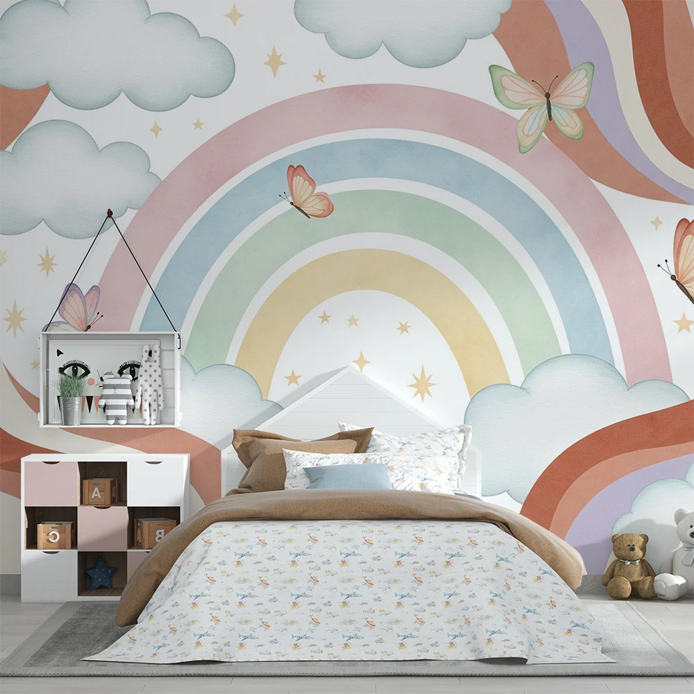 Papel de parede quarto bebê | Arco-íris pastel e borboletas em um céu nublado