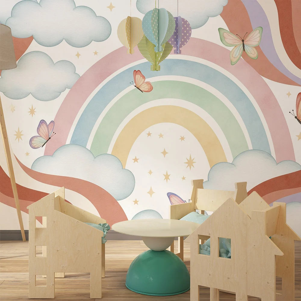 Papel de parede quarto bebê | Arco-íris pastel e borboletas em um céu nublado
